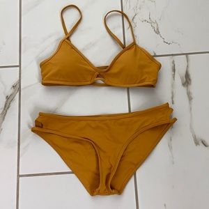 L space bronze swim suit size medium